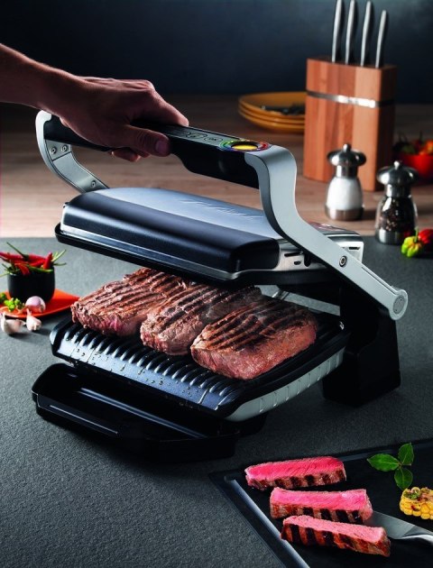 Tefal Grill Tefal OptiGrill GC712D34 (stołowy-zamknięty; 2000W; kolor inox) (WYPRZEDAŻ) Tefal Grill Tefal OptiGrill GC712D34 (stołowy-zamknięty; 2000W; kolor inox) (WYPRZEDAŻ)